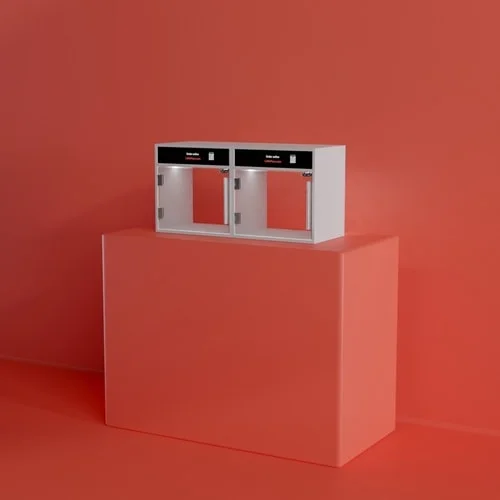 Boxie countertop smart locker with two lit pickup compartments on a restaurant counter
